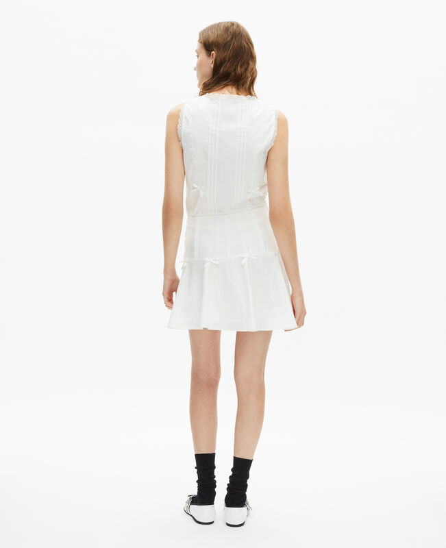The Kooples FEMME ECRU jupe courte détails nœuds écrue
