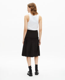The Kooples FEMME BLACK jupe midi plissée noire