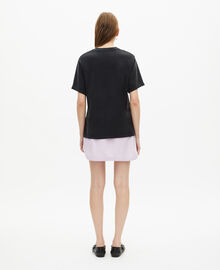 The Kooples FEMME BLACK WASHED t-shirt avec sérigraphie en strass noir délavé
