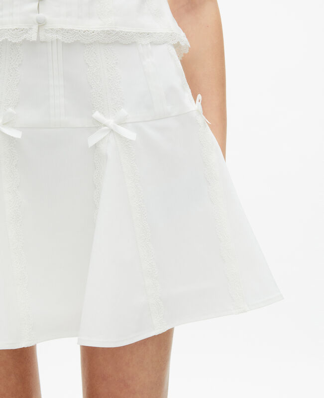 The Kooples FEMME ECRU jupe courte détails nœuds écrue