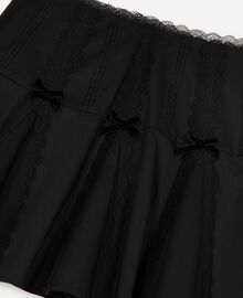 The Kooples FEMME BLACK jupe courte détails nœuds noire