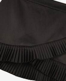 The Kooples FEMME BLACK jupe courte style portefeuille satinée noire