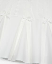 The Kooples FEMME ECRU jupe courte détails nœuds écrue